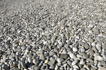 Background image of gray pebbles on a beach