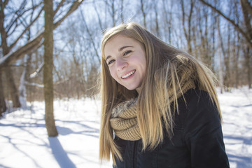 Attractive young woman in wintertime outdoor