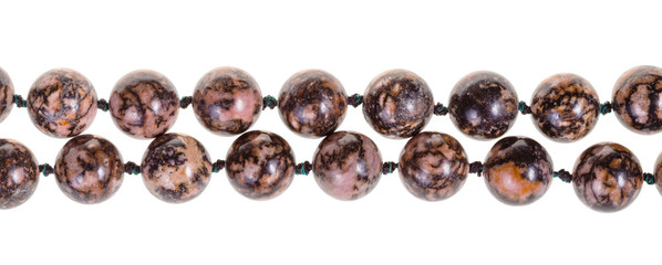 two strings of beads from rhodonite gem stone