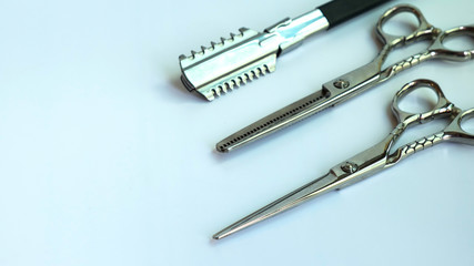 Scissors for cut hair on the white background.Tools for hair cut