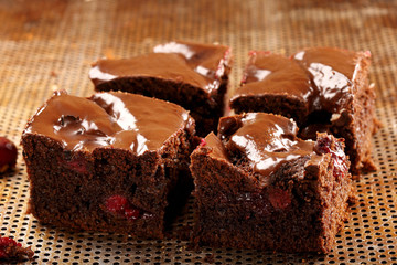 Chocolate cake with cherries and icing