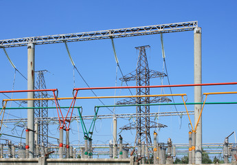Electrical power high voltage substation encircled with barbed wire fence