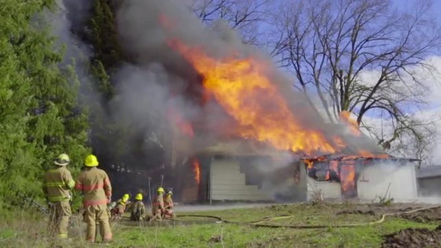 Firefighters can't stop a house from burning down 