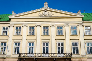 Lviv regional administration building with columns, windows and balcony on a sunny day