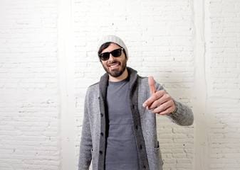 Obraz premium young attractive hipster and trendy style looking man posing coo