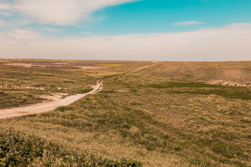 Fototapeta premium Road in Iraqi desert during spring season near Kirkuk city