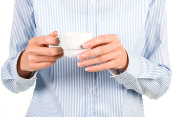 Lady's hand with tea cup.