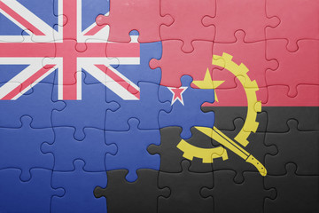 puzzle with the national flag of angola and new zealand