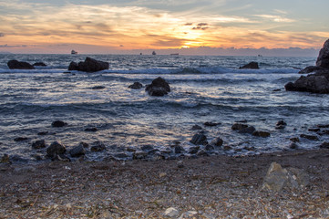Obraz premium Antignano,tramonto allo scoglio della Ballerina.