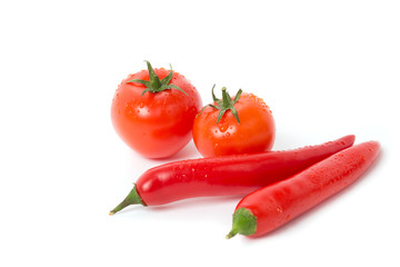 isolated tomato with pepper on white background