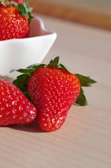fresh strawberries on wooden table