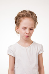 Portrait of beautiful teen girl with a disgusting face