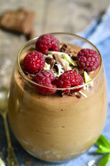 Chocolate mousse with raspberry.