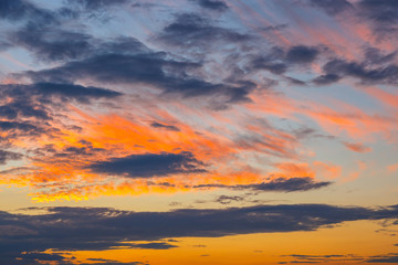 orange, blue and yellow colors sunset sky