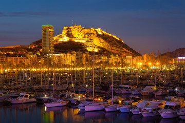 Naklejka premium Port with yachts in night. Alicante