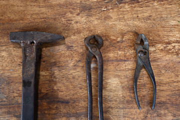 Old tools on a wooden table