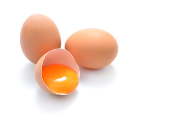 Close up of cracked egg isolated on white background © amenic181
