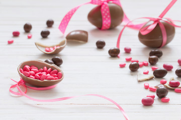 Chocolate Easter Eggs Over Wooden Background