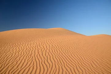 Gardinen Rippled sand dunes © maurusasdf