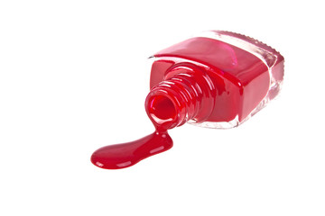 Red nail polish on a white background