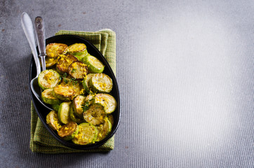 Fried zucchini with lemon zest