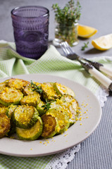Fried zucchini with lemon zest