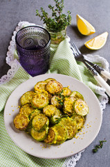 Fried zucchini with lemon zest