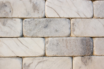 Fototapeta premium brick wall of travertine veined