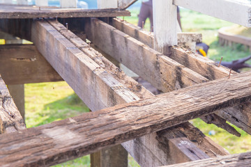 Damaged or broken wooden bridge or walkway.