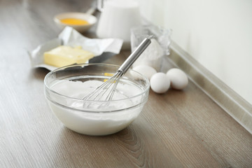 Cooking buttery cream on kitchen