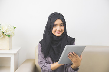 Beautiful asian girl with tablet computer