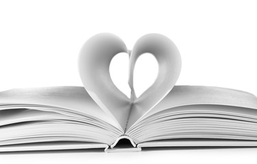 Heart from book pages on light grey background