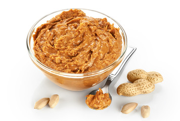 Bowl with peanut butter and peanuts isolated on white background