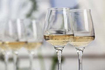 Glasses of white wine closeup