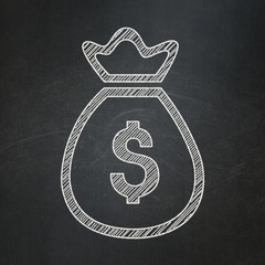 Currency concept: Money Bag on chalkboard background