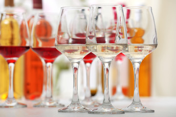 Wine glasses with red and white wine, closeup