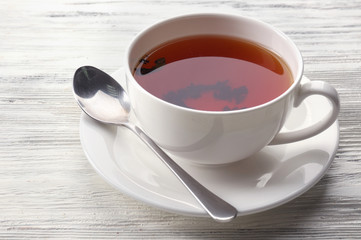 Cup of tea on white table
