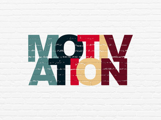 Business concept: Motivation on wall background