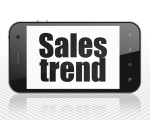 Advertising concept: Smartphone with Sales Trend on display