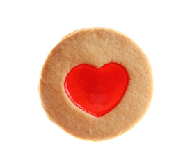 Tasty cookie with heart shape jam filling isolated on white background