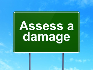 Insurance concept: Assess A Damage on road sign background