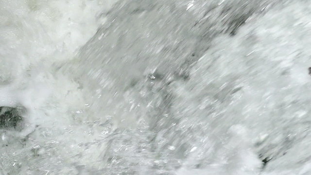 Beautiful waterfall in nature in close up in slow motion, Slow Motion Video Clip