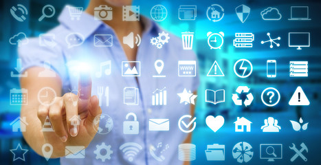 Businesswoman using digital tactile screen interface with web ic