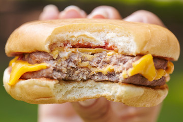 woman eating hamburger
