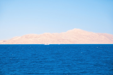 Egypt. View from the sea on a deserted sandy beach. Tiran Island