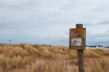 Conservation and Nature Reserve
Wooden sign in conservation area. Taken at Dawlish Warren in Devon in UK