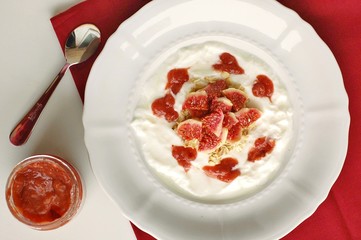 Yogurt with strawberry jam and fig