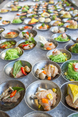 a variety of dim sum in small plate