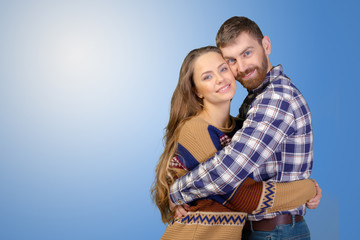 Cheerful young couple standing