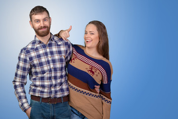 Cheerful young couple standing